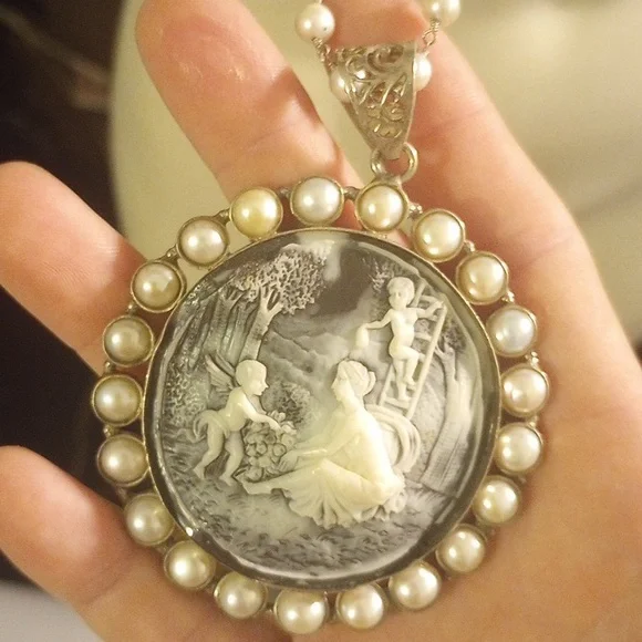 SaFia Signed Longer Pearl Necklace with Silver Cameo Pendant.